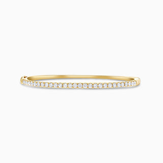 The Seamless Linea 18k yellow gold bracelet with diamonds