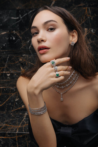 a woman wearing Compositions jewelry